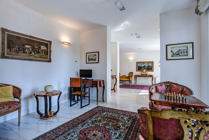 Imagen de los interiores del Hotel Rimini Suite. Foto 11