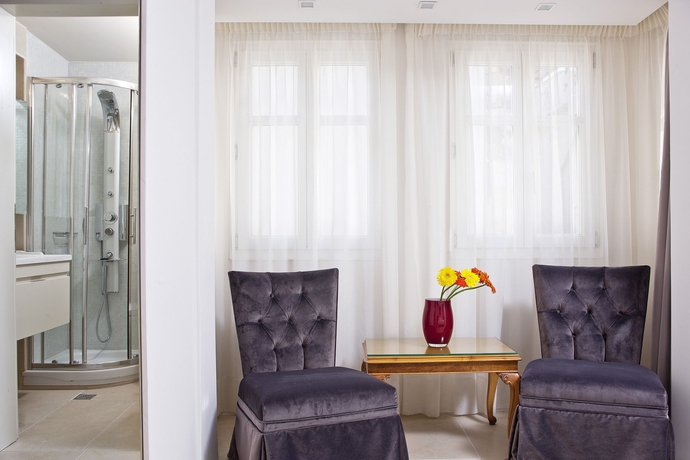 Imagen de la habitación del Hotel Rimondi Boutique Hotels. Foto 5