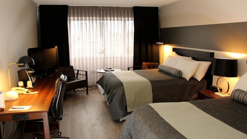 Imagen de la habitación del Hotel Rimouski. Foto 13
