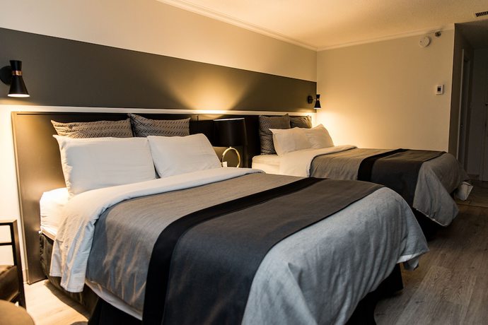 Imagen de la habitación del Hotel Rimouski. Foto 14
