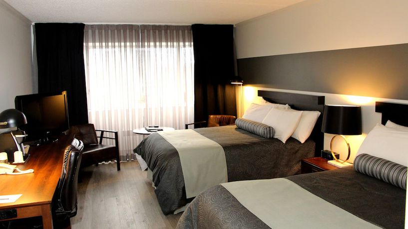 Imagen de la habitación del Hotel Rimouski. Foto 17