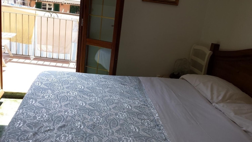 Imagen de la habitación del Hotel Rina Rooms. Foto 14