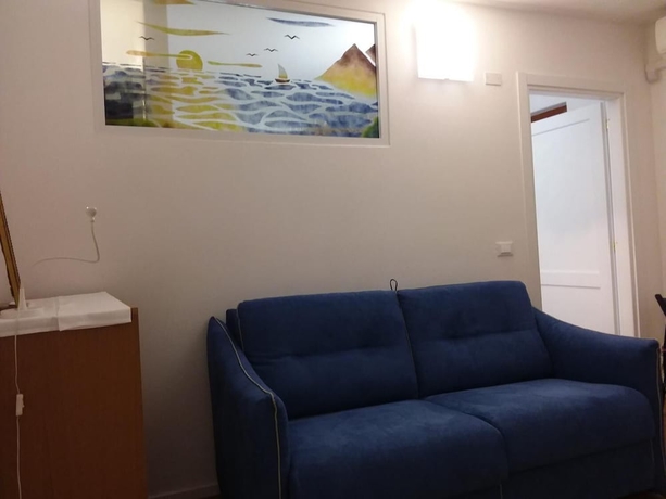 Imagen de la habitación del Hotel Rina Rooms. Foto 18