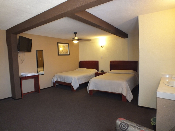 Imagen de la habitación del Hotel Rincón Real Suites. Foto 9