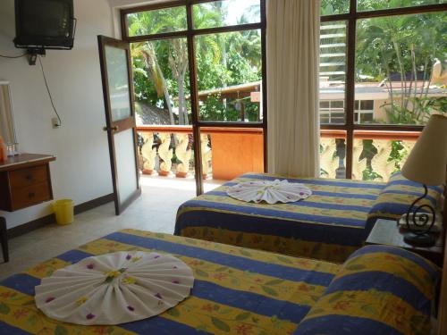 Imagen de la habitación del Hotel Rincon Del Pacifico. Foto 7