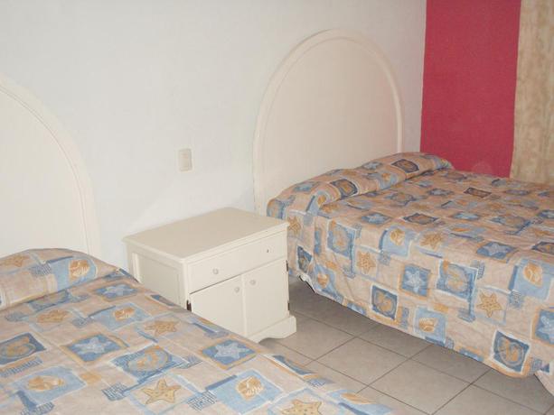 Imagen de la habitación del Hotel Rincon Real. Foto 8