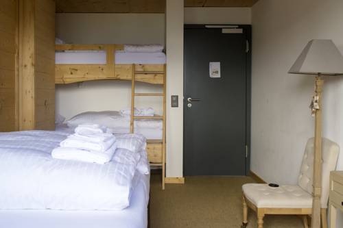 Imagen de la habitación del Hotel Rinderberg Swiss Alpine Lodge. Foto 6