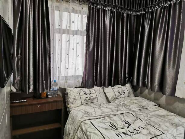Imagen de la habitación del Hotel Ring Wood Guest House. Foto 16