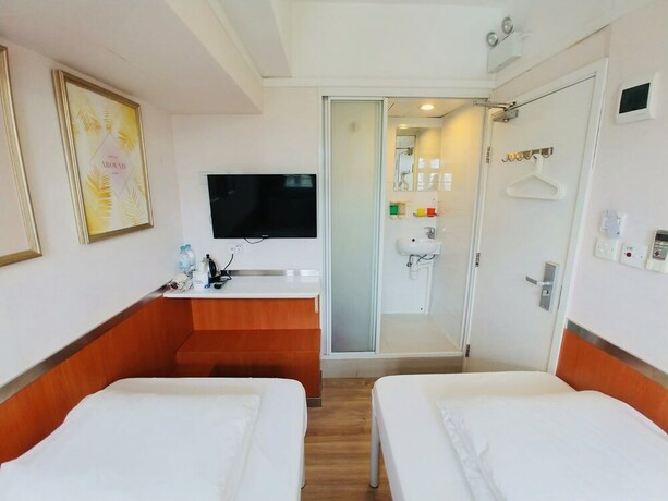Imagen de la habitación del Hotel Ring Wood Guest House. Foto 18