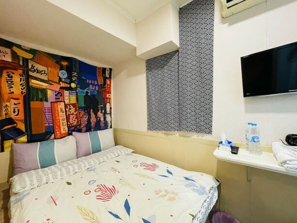 Imagen de la habitación del Hotel Ring Wood Guest House. Foto 19