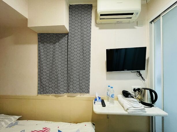 Imagen de la habitación del Hotel Ring Wood Guest House. Foto 24