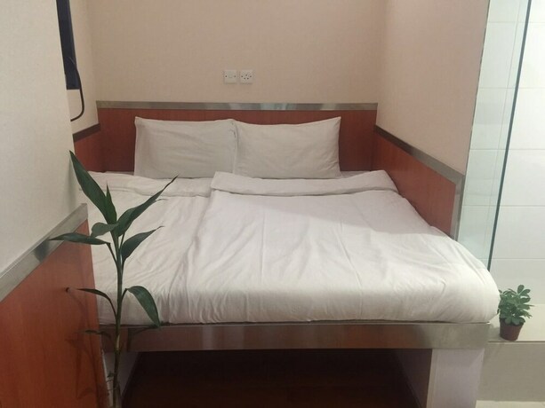 Imagen de la habitación del Hotel Ring Wood Guest House. Foto 29