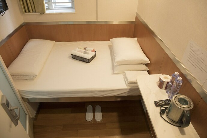 Imagen de la habitación del Hotel Ring Wood Guest House. Foto 31