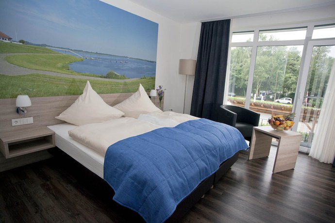 Imagen de la habitación del Hotel Ringhotel Alfsee Piazza. Foto 4