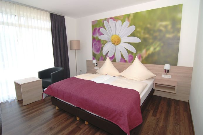 Imagen de la habitación del Hotel Ringhotel Alfsee Piazza. Foto 10