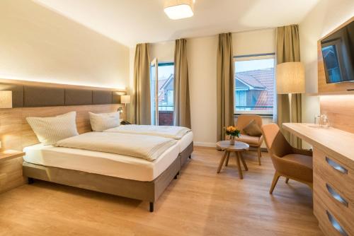 Imagen de la habitación del Hotel Ringhotel Altes Zollhaus. Foto 10