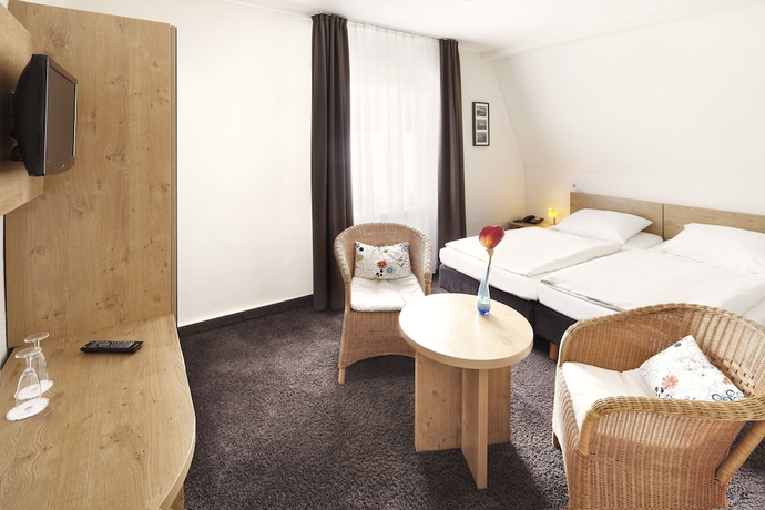 Imagen de la habitación del Hotel Ringhotel Jensen. Foto 8