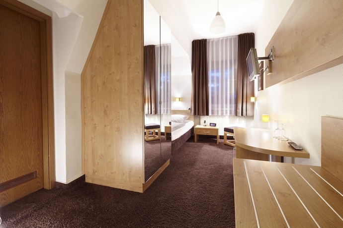 Imagen de la habitación del Hotel Ringhotel Jensen. Foto 13