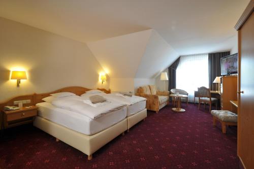 Imagen de la habitación del Hotel Ringhotel Niedersachsen. Foto 10