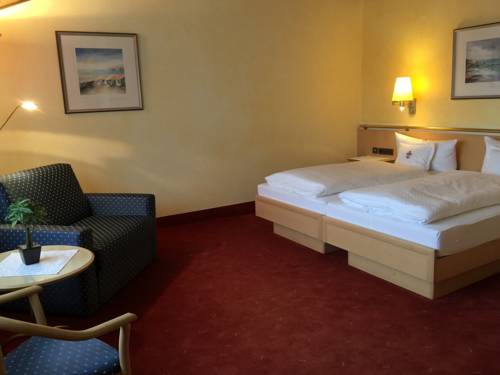 Imagen de la habitación del Hotel Ringhotel Winzerhof. Foto 7