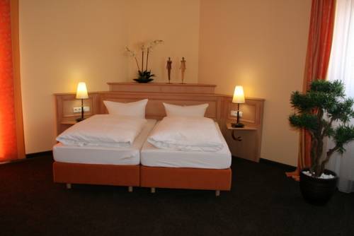 Imagen de la habitación del Hotel Ringhotel Winzerhof. Foto 16