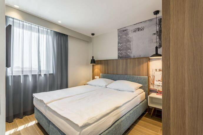 Imagen de la habitación del Hotel Ringo Apartments. Foto 17