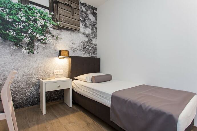 Imagen de la habitación del Hotel Ringo Apartments. Foto 18