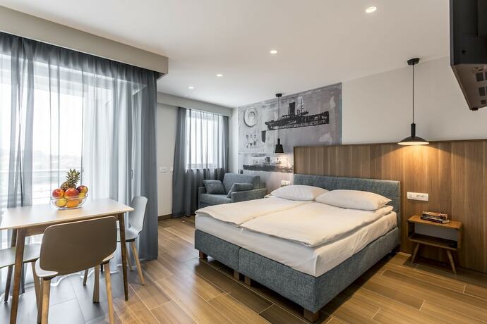 Imagen de la habitación del Hotel Ringo Apartments. Foto 19