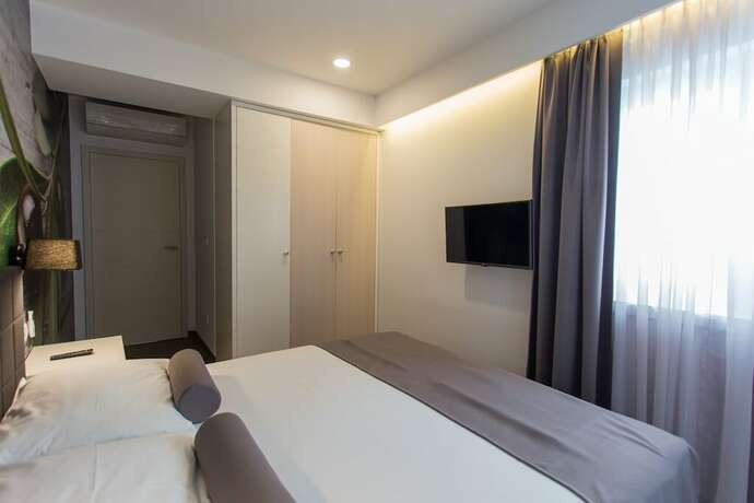 Imagen de la habitación del Hotel Ringo Apartments. Foto 20