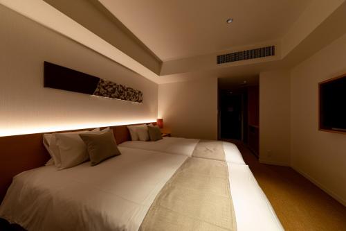 Imagen de la habitación del Hotel Rings Kyoto. Foto 2