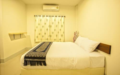 Imagen de la habitación del Hotel Rinlada House. Foto 13