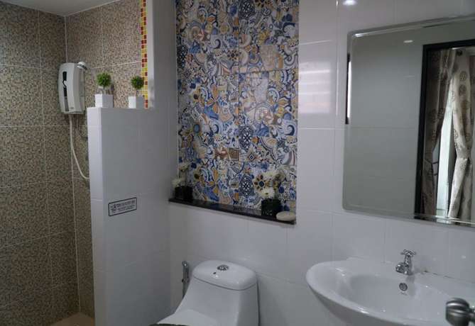 Imagen de la habitación del Hotel Rinn Boutique House. Foto 10