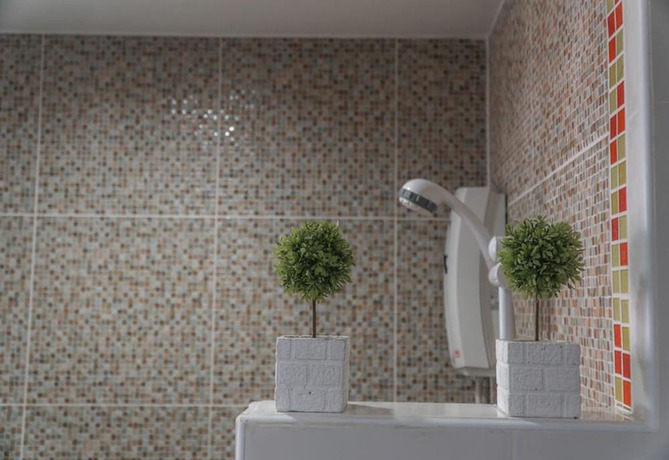 Imagen de la habitación del Hotel Rinn Boutique House. Foto 11