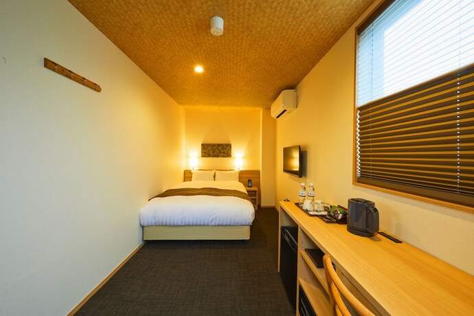Imagen de la habitación del Hotel Rinn Gojo Omiya. Foto 18