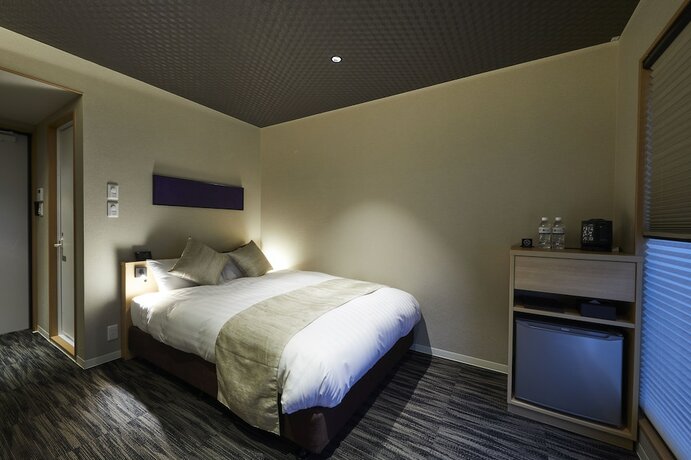 Imagen de la habitación del Hotel Rinn Higashi Otowa. Foto 7