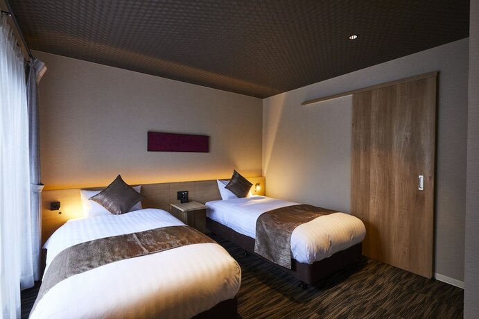 Imagen de la habitación del Hotel Rinn Higashi Otowa. Foto 8