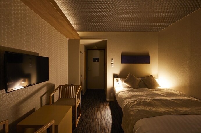 Imagen de la habitación del Hotel Rinn Higashi Otowa. Foto 14