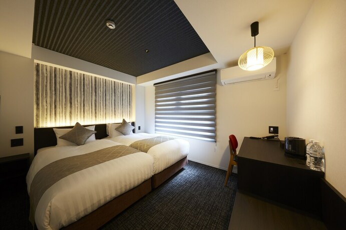 Imagen de la habitación del Hotel Rinn Kamiebisu. Foto 16
