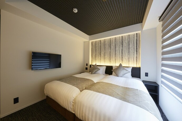Imagen de la habitación del Hotel Rinn Kamiebisu. Foto 18