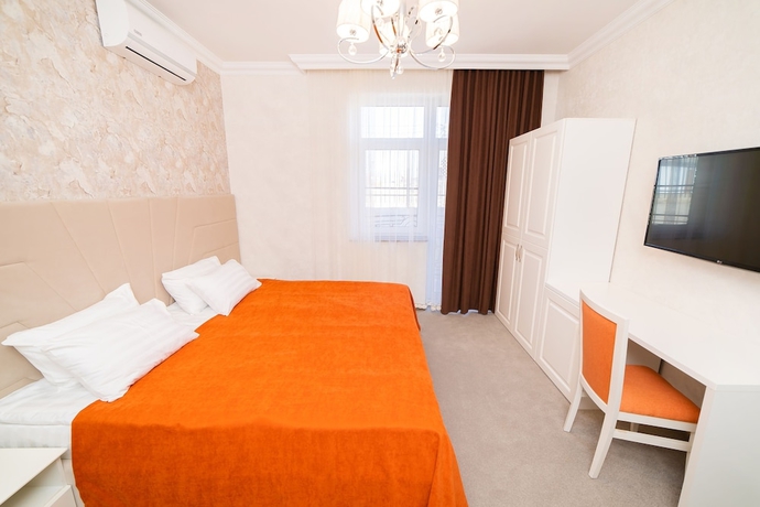 Imagen de la habitación del Hotel Rinn Rise. Foto 2