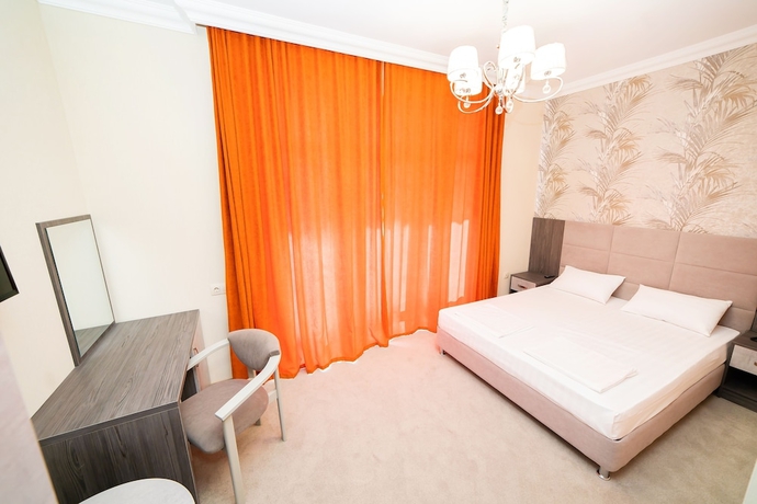 Imagen de la habitación del Hotel Rinn Rise. Foto 6