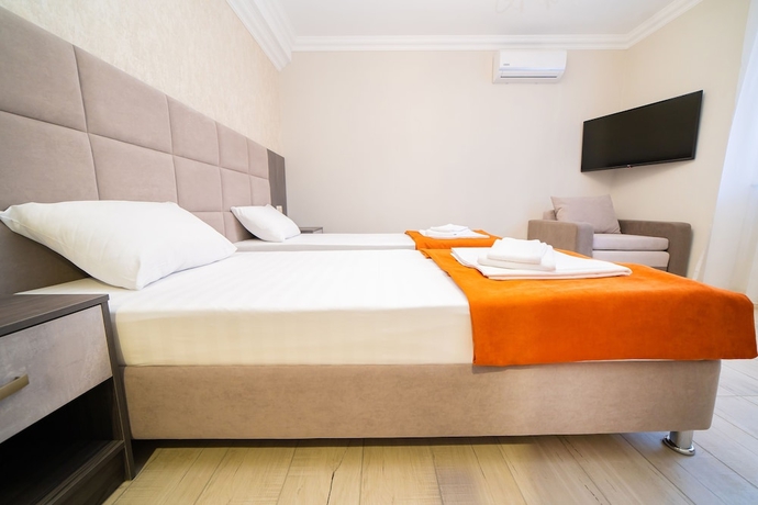 Imagen de la habitación del Hotel Rinn Rise. Foto 8