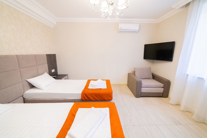 Imagen de la habitación del Hotel Rinn Rise. Foto 9