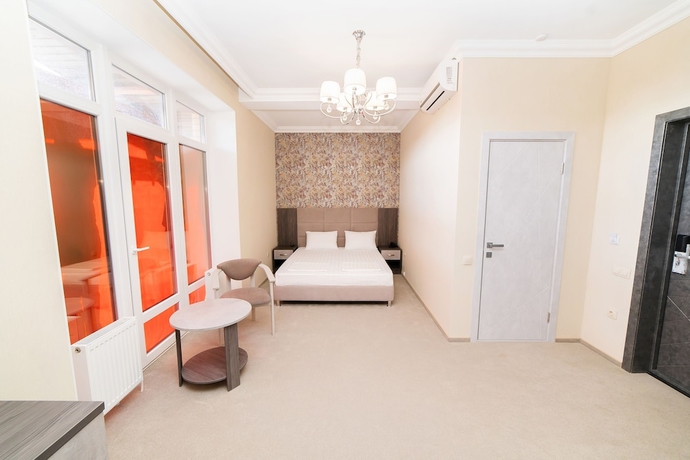 Imagen de la habitación del Hotel Rinn Rise. Foto 11