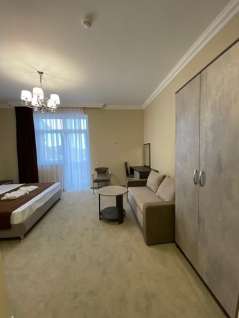 Imagen de la habitación del Hotel Rinn Rise. Foto 13
