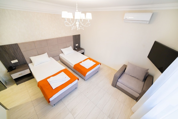 Imagen de la habitación del Hotel Rinn Rise. Foto 15