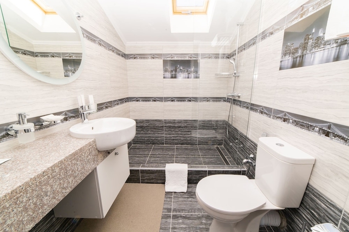 Imagen de la habitación del Hotel Rinn Rise. Foto 18