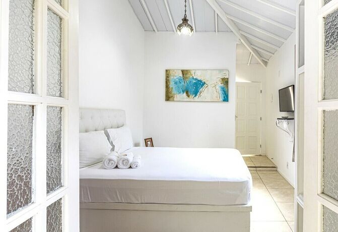Imagen de la habitación del Hotel RioZin Pousada Liberal - Adults Only - Clothing Optional. Foto 13