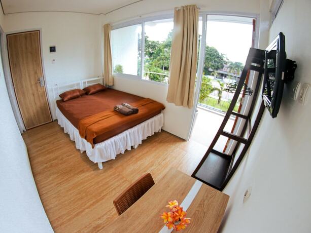 Imagen de la habitación del Hotel Rion Hostel Bogor. Foto 12