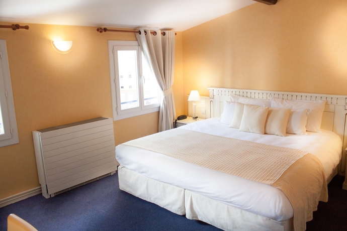 Imagen de la habitación del Hotel Riquet. Foto 14